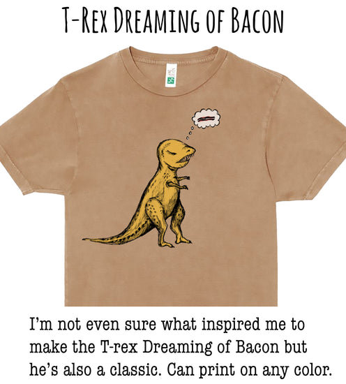 a T-Rex dinosaur with a thought bubble above it, wearing a brown t-shirt.