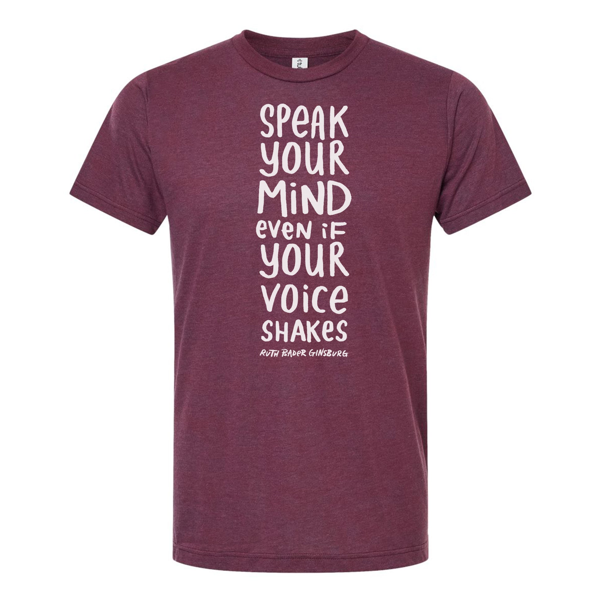 The image is a maroon t-shirt with white text printed on it. The text reads "Speak your mind even if your voice shakes".