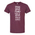 The image is a maroon t-shirt with white text printed on it. The text reads "Speak your mind even if your voice shakes".