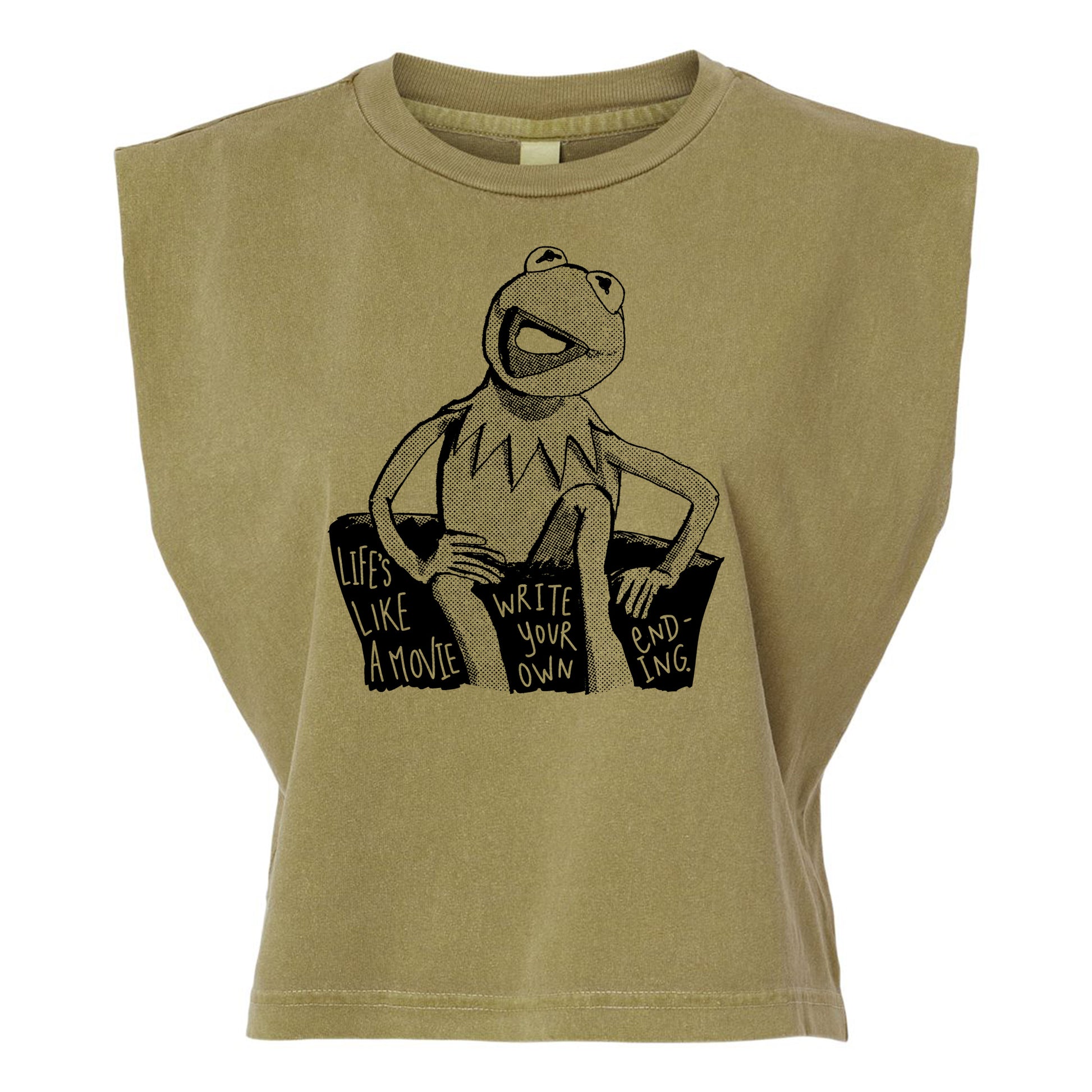 A t-shirt with a graphic design featuring a frog character and text that reads "Lives like a movie, write your own, ending -ing".