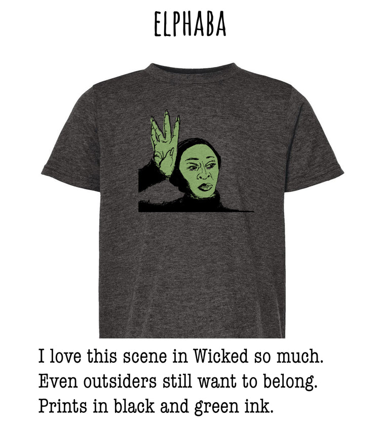 A gray t-shirt with a graphic design depicting a character from the movie "Wicked" with a greenish-green color scheme.