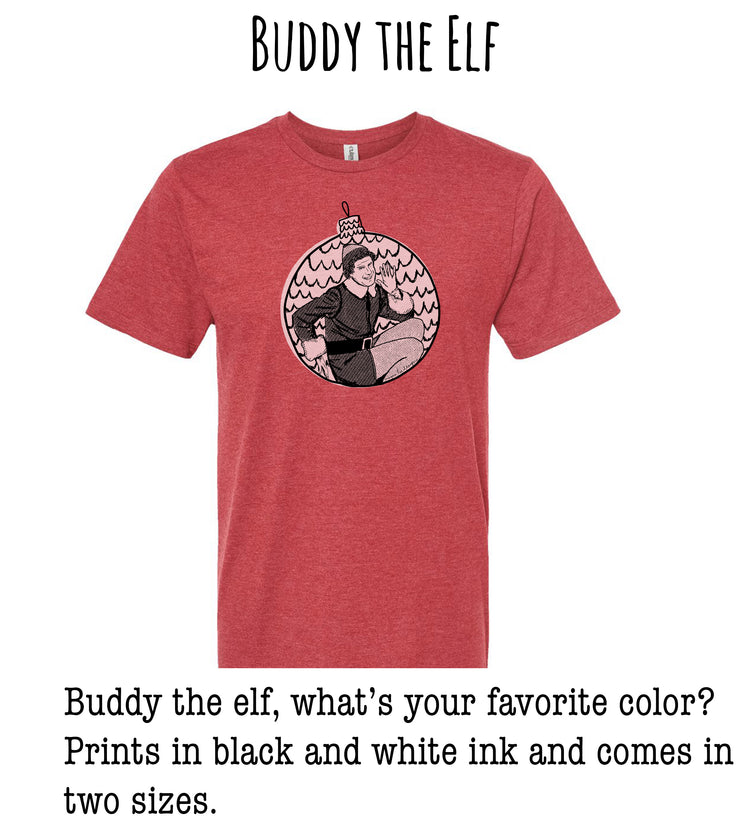 A red t-shirt with a graphic of a person in a black and white outfit, resembling the character Buddy the Elf from the movie "The Snow Queen".