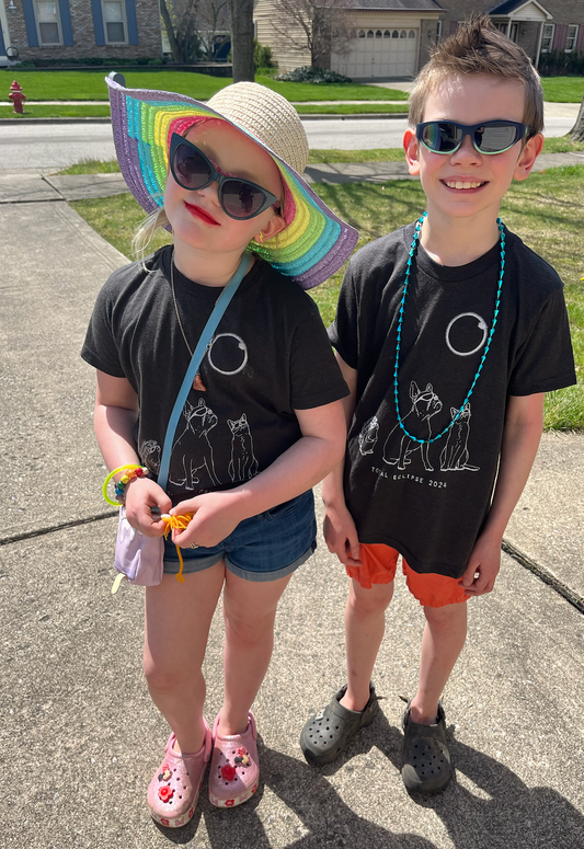 two young children wearing sun glasses and hats