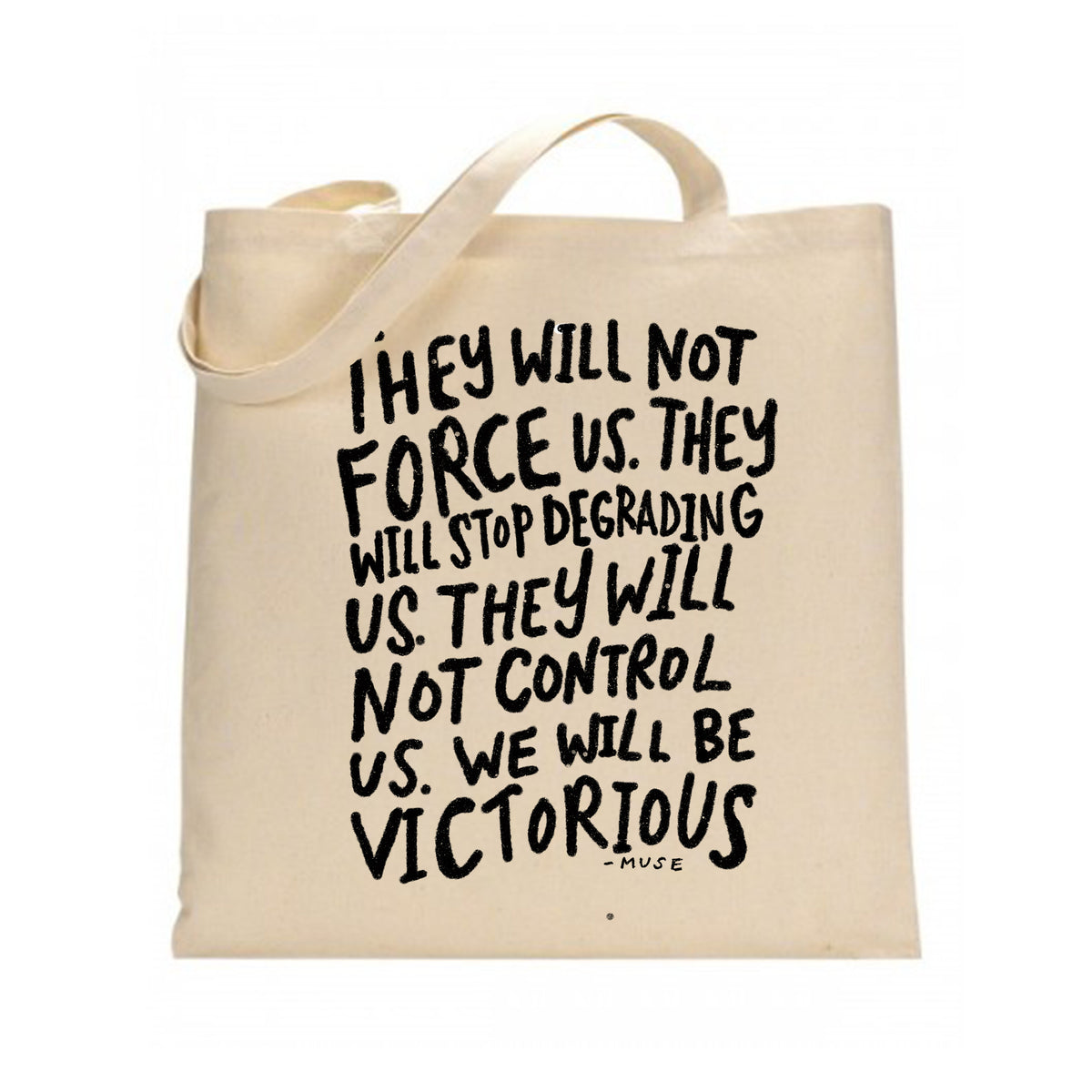 a beige tote bag with a bold, black text quote printed on it. The quote reads, "They will not force us. They will stop degrading us. They will not control us. We will be victorious."