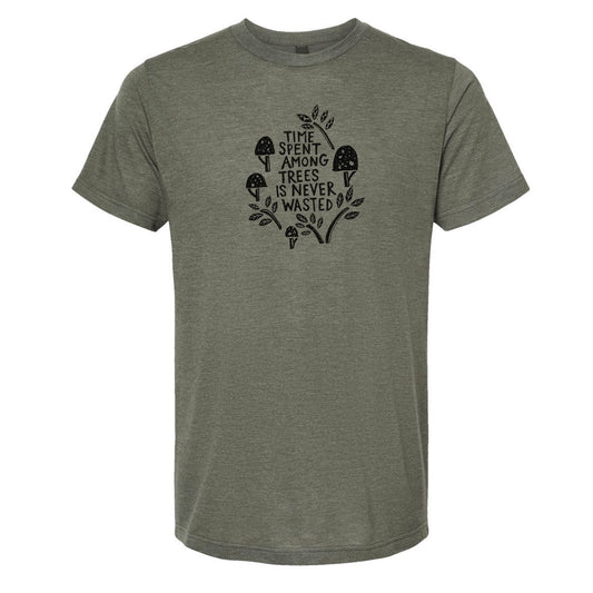 A gray t-shirt with a graphic design featuring a mushroom and leaves, along with the text "Time spent among trees is never wasted".