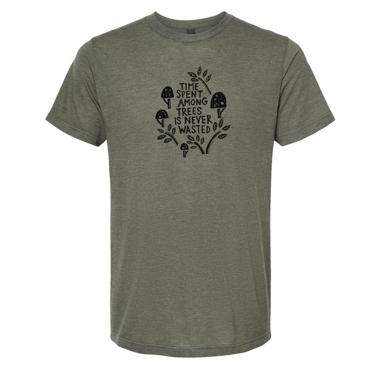 A gray t-shirt with a graphic design featuring a mushroom and leaves, along with the text "Time spent among trees is never wasted".
