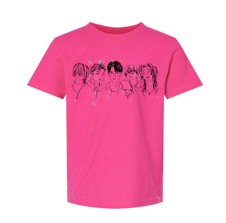 A pink t-shirt with a graphic design featuring a group of stylized human faces.