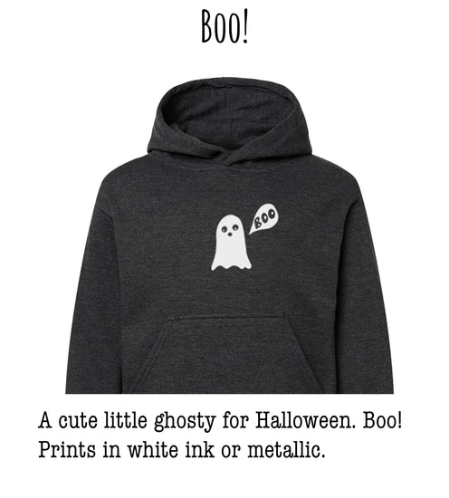 A cute little ghostly figure with the word "BOO!" printed on a dark grey hoodie.