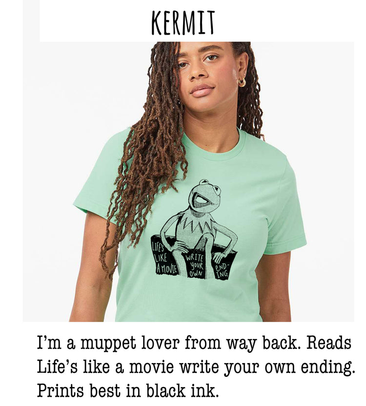 A person wearing a green t-shirt with a Kermit the Frog graphic and text, posing for a portrait.