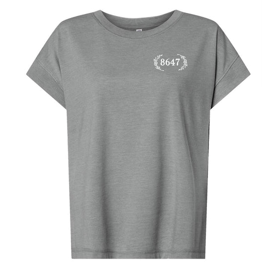 A gray t-shirt with the number 8647 printed on the left side of the chest.