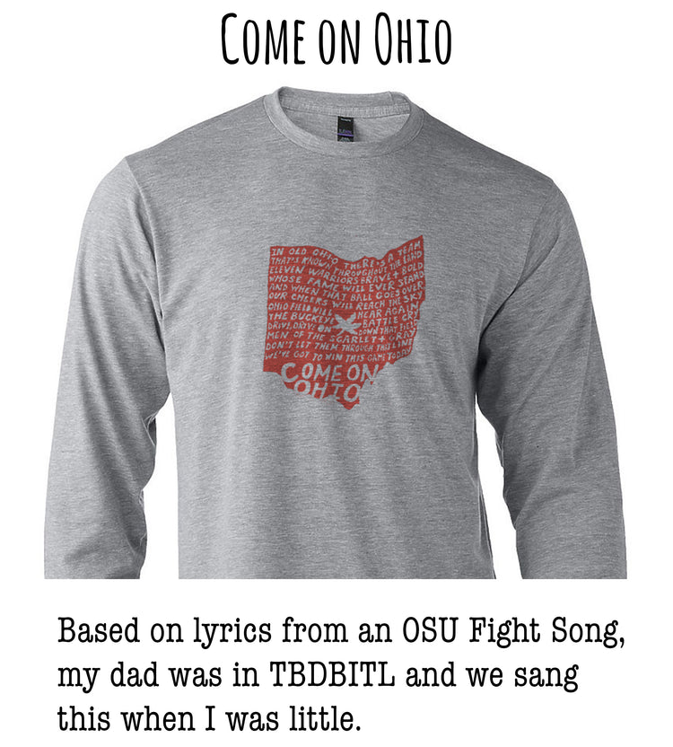 A gray long-sleeved t-shirt with a red graphic design depicting the state of Ohio, along with the text "Come on Ohio" and a caption that says "Based on lyrics from an OSU Fight Song, my dad was in TDBBITL and we sang this when I was little."