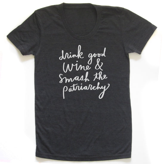 A black t-shirt with white text printed on it.