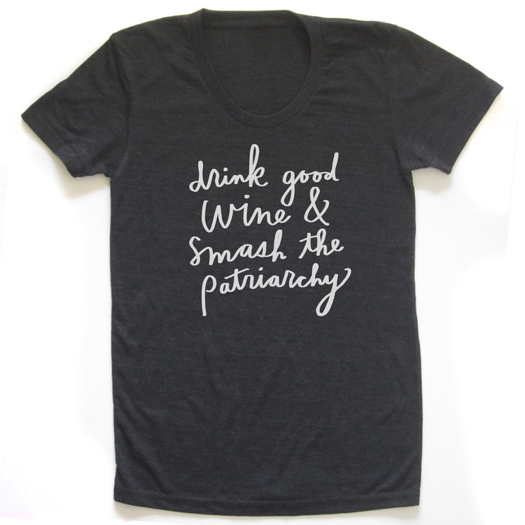 A black t-shirt with white text printed on it.