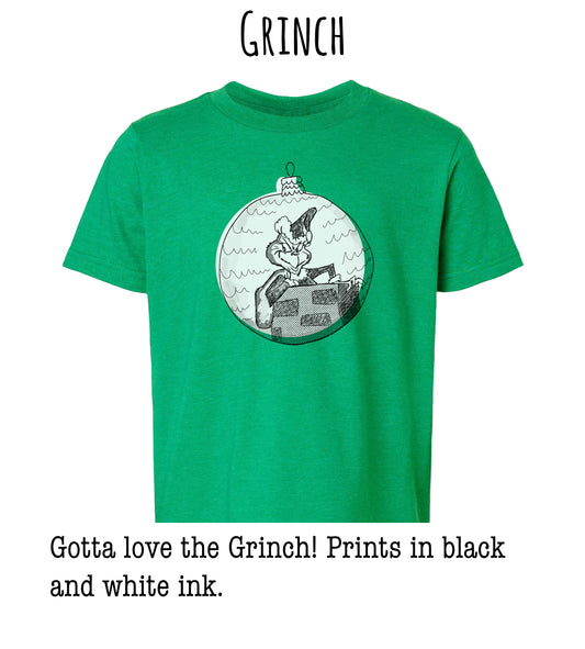 A green t-shirt with a graphic of a character from the classic film "The Grinch".