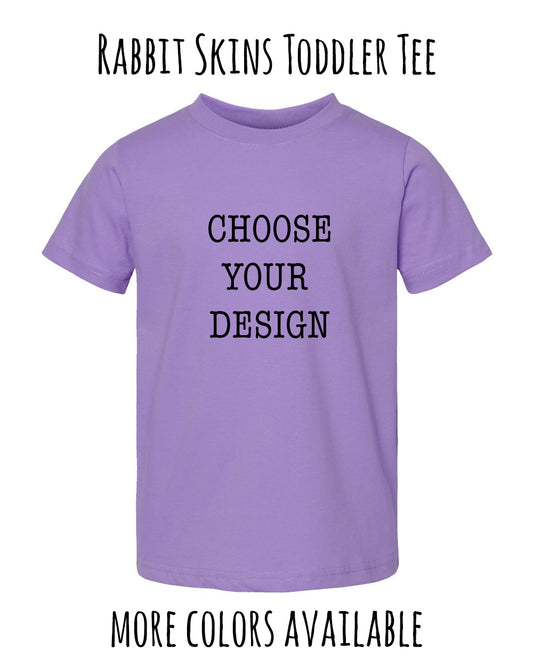 A purple t-shirt with the text "CHOOSE YOUR DESIGN" printed on it.