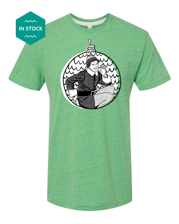 a green t - shirt with a picture of a man on it
