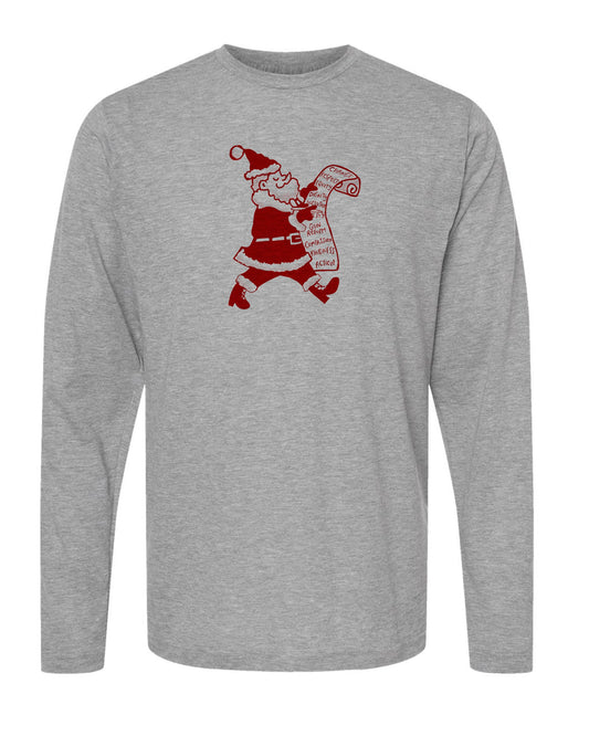 A gray long-sleeve t-shirt with a red graphic design depicting a cartoon Santa Claus figure holding a scroll and a list of Christmas wishes.