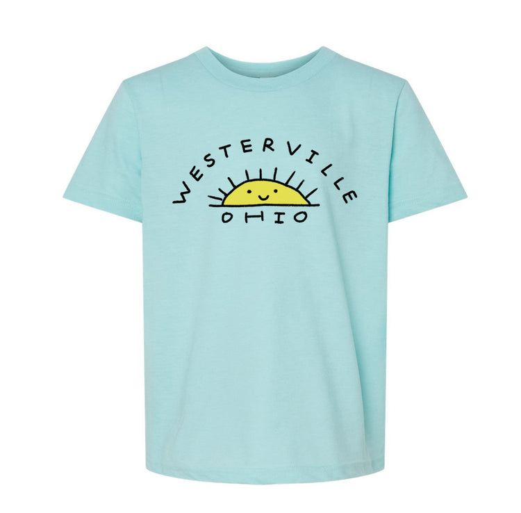A light blue t-shirt with a graphic design featuring a sun and the text "WESTERVILLE OHIO" printed on it.
