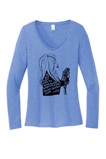 a blue shirt with a drawing of a woman holding a microphone