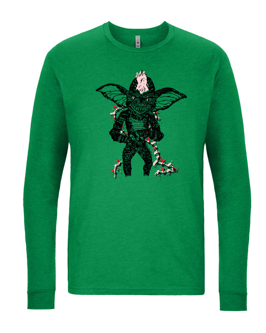 A green long-sleeved shirt with a graphic of a green alien-like creature with large ears and a head, holding a weapon in its hand.