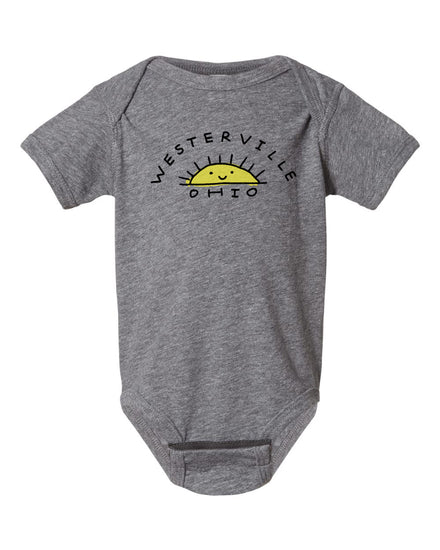 A gray baby onesie with the text "WESTERVILLE OHIO" printed on it.