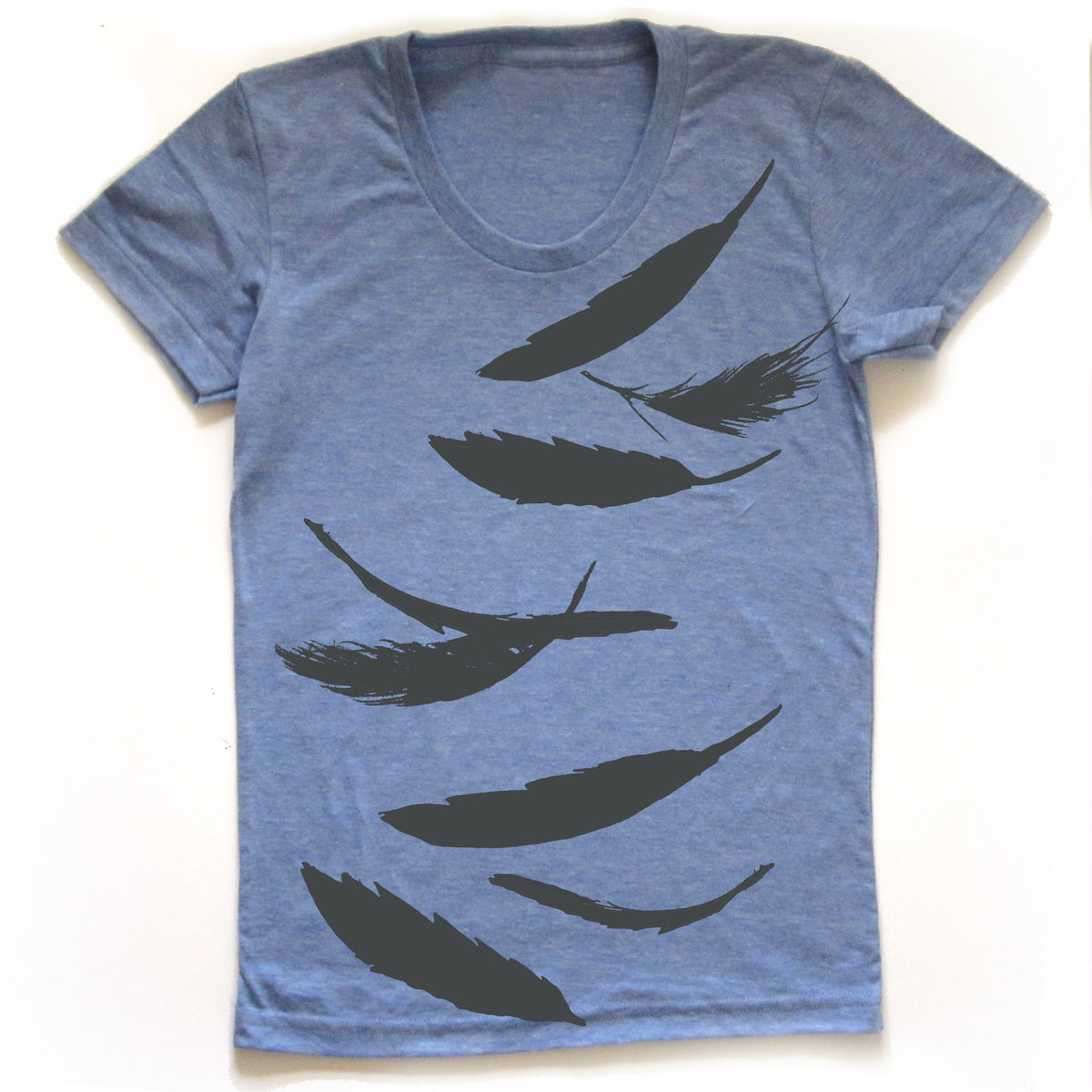 A blue t-shirt with a graphic design of black silhouettes of feathers.