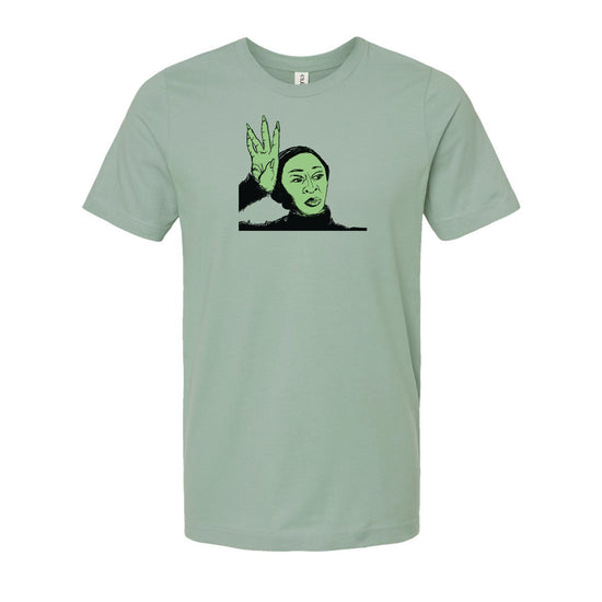 A t-shirt with a graphic design depicting a person's face with raised arms.