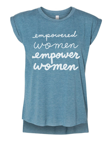 A blue t-shirt with the text "empowered women empower women" printed on it in white lettering.