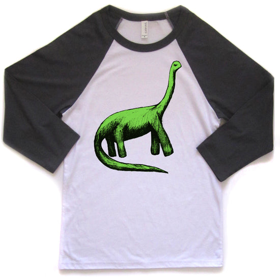 A white and black baseball-style t-shirt with a green dinosaur graphic printed on it.