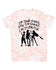 A t-shirt with a graphic design featuring silhouettes of three people and text that reads "I'm done hiding now I'm shining like I'm born to be".