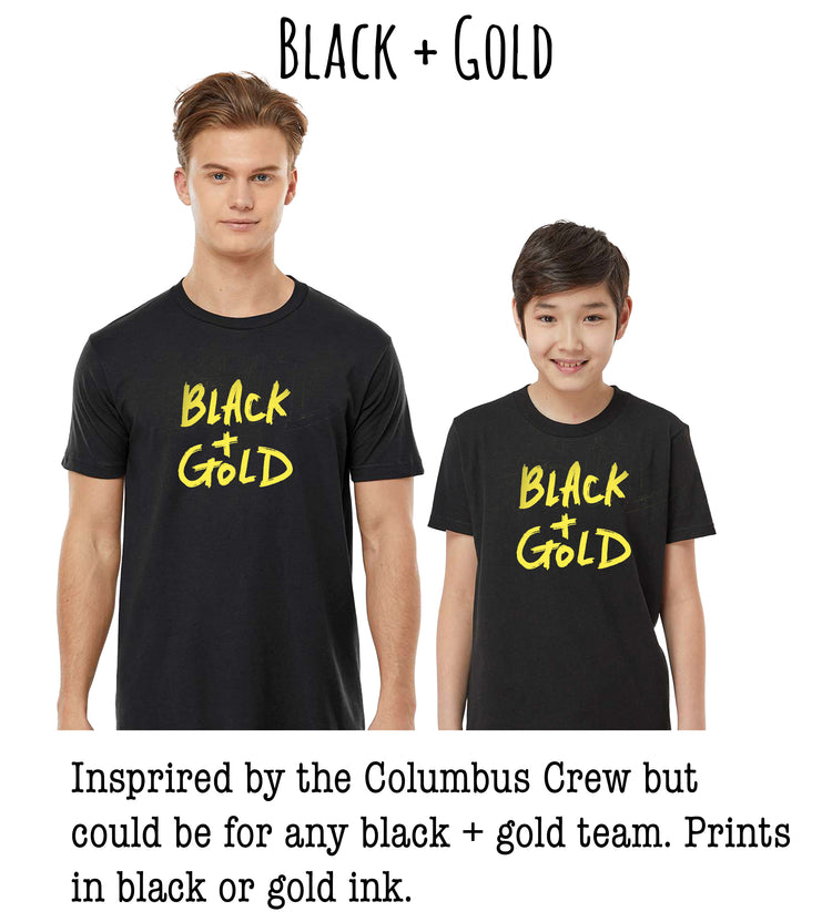 two young boys wearing black t-shirts with the text "Black + Gold" printed on them.