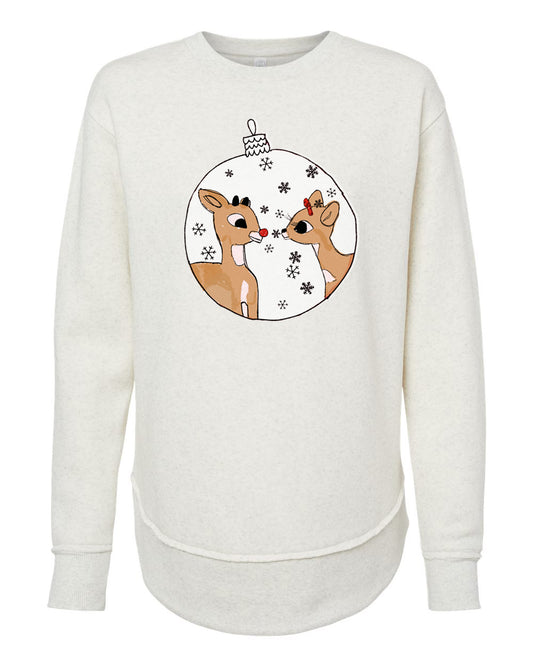 A white long-sleeved sweatshirt with a graphic design featuring two cartoon reindeer inside a snow globe.