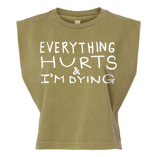 a brown t-shirt with white text printed on it. The text reads "EVERYTHING HURTS & I'M DYING".