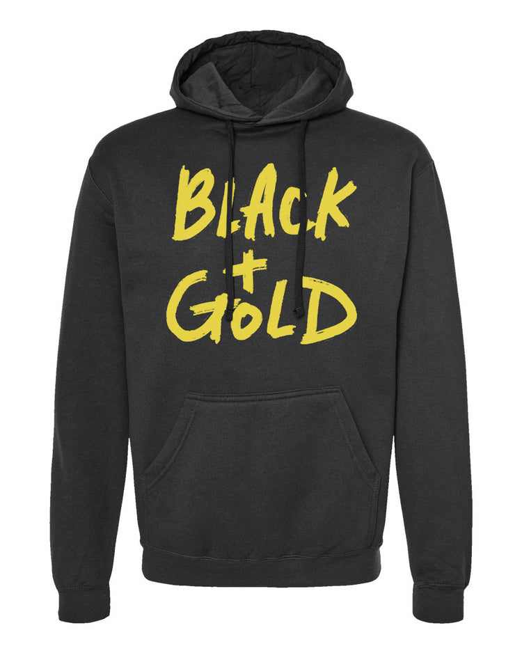 A black hoodie with yellow text that says "BLACK + GOLD".