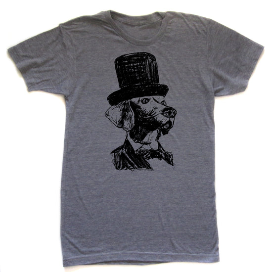 A gray t-shirt with a black and white illustration of a dog wearing a top hat.