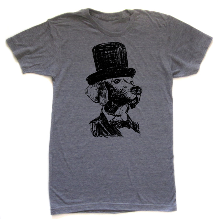 A gray t-shirt with a black and white illustration of a dog wearing a top hat.