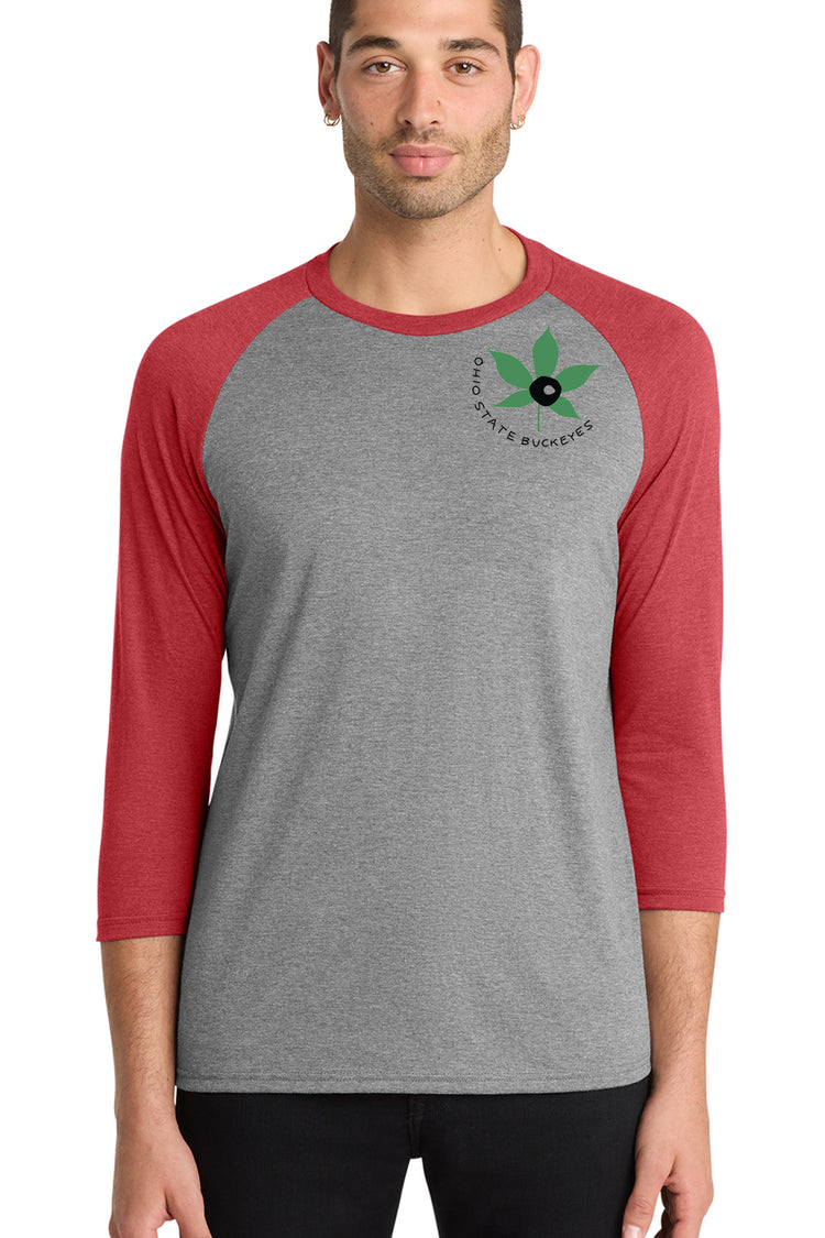 A man wearing a gray and red baseball tee shirt with a graphic of a leaf and the text "Ohio State Buckeye" on the front.