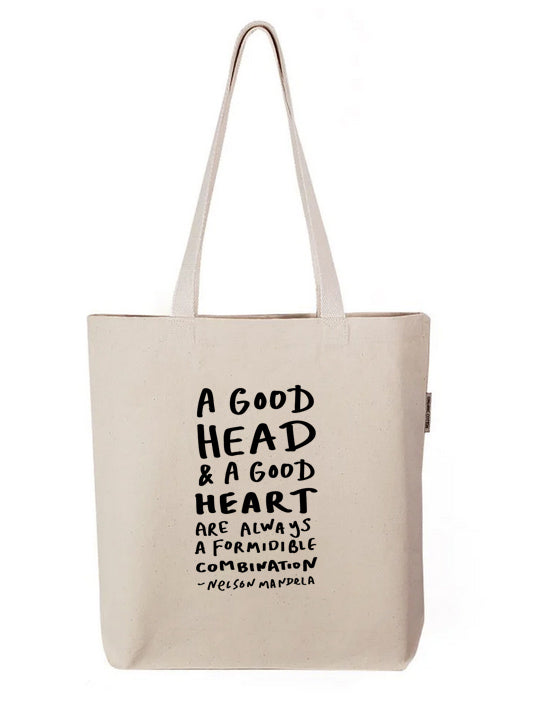 a white tote bag with black writing on it